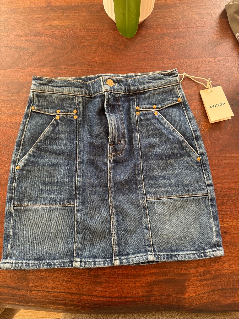 MOTHER The Riveter Mini Skirt in the "Bending The Rules" wash
